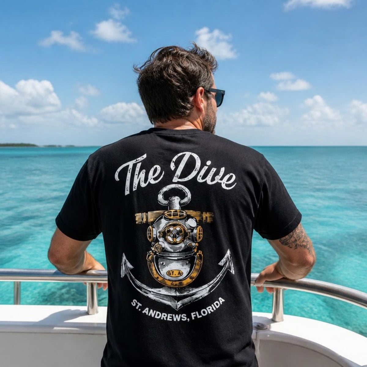 The Dive t-shirt back print on a boat