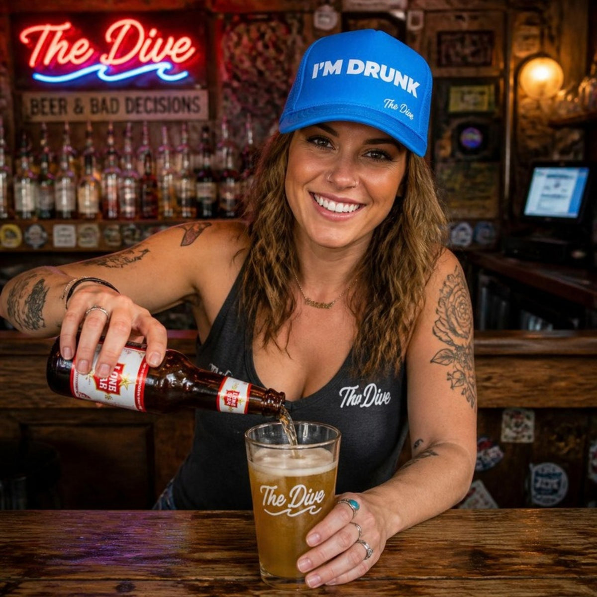 Bartender wearing the teal I Am RUNK hat